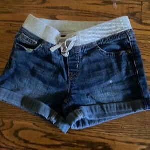 Dark blue and grey jean shorts. Very stylish!